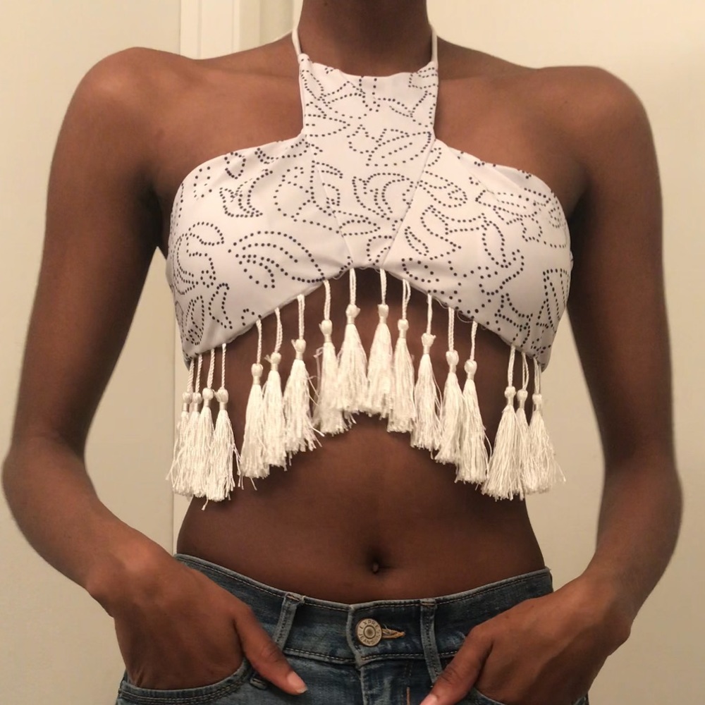 White bathing suit top with hanging tassels
